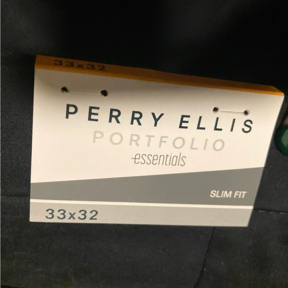 Perry Ellis brand, size 33 x 32, new with tags, dark sapphire color, men’s pants